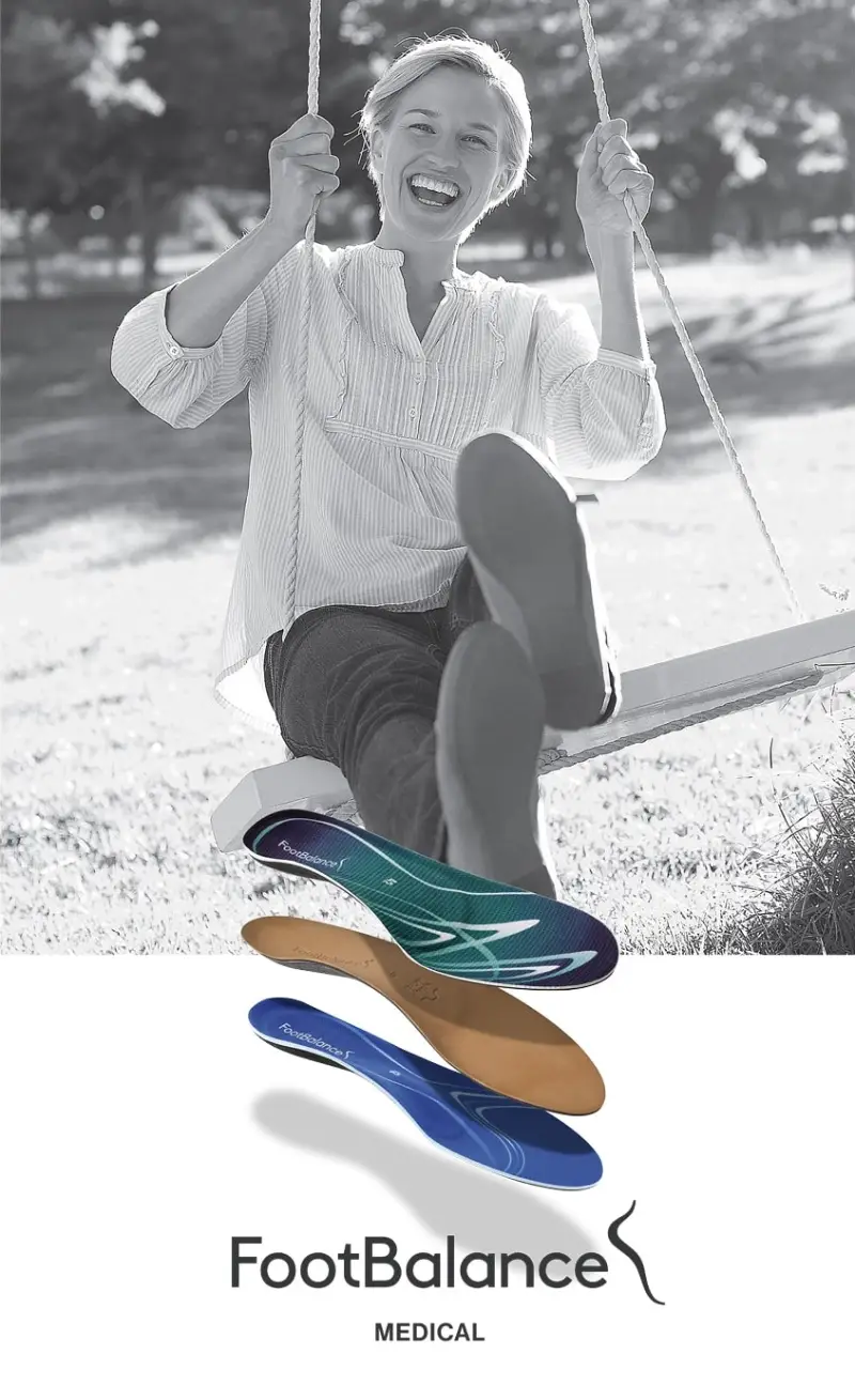 FootBalance insoles advertisement showing woman happy on a swing